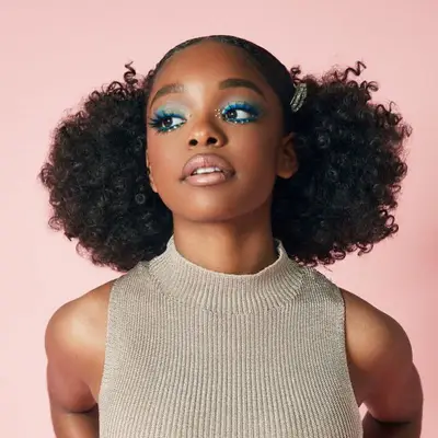 Marsai Martin wears a pinned-down Afro hairstyle