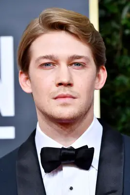 Joe Alwyn with parted hair