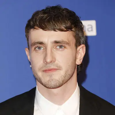 Paul Mescal with longer on top short on sides hair and bangs