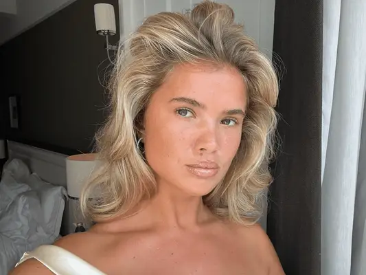 A close up of Matilda Djerf with a voluminous hairstyle.