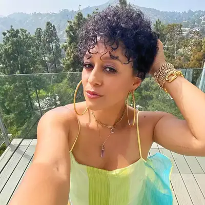Tia mowry wearing short curly hair