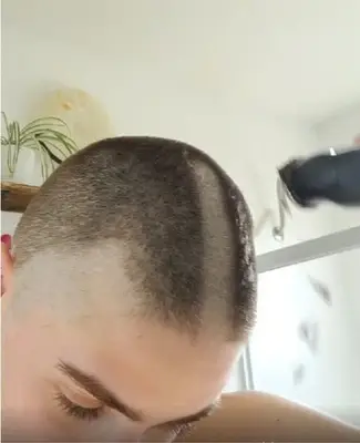 Woman buzzing top of head