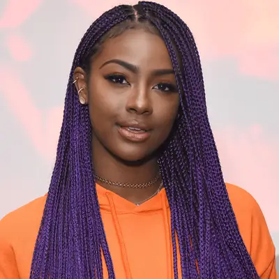 justine skye with purple knotless braids