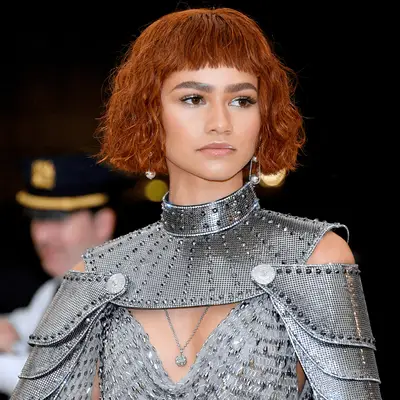 zendaya wearing copper curly bob