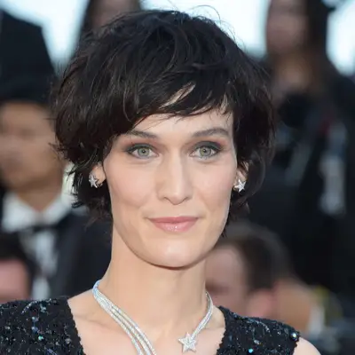 Clotilde Hesme attends Cannes with a disheveled texture to her black pixie cut 