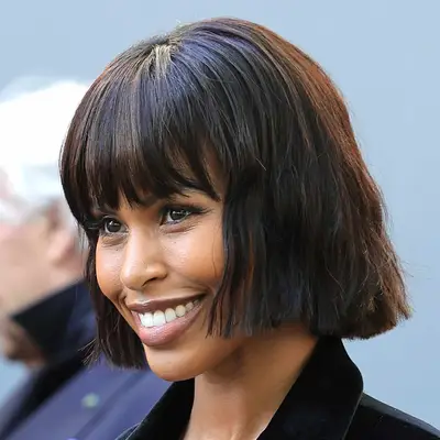 Sabrina Dhowre Elba attends fashion week with a jaw-length bob and brow grazing fringe