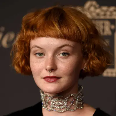 Kacy Hill attends NYC event with micro bob and micro bangs in her natural wavy texture