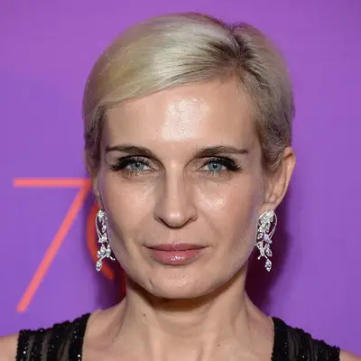Director Melita Toscan Du Plantier attends Cannes in an icy blonde pixie