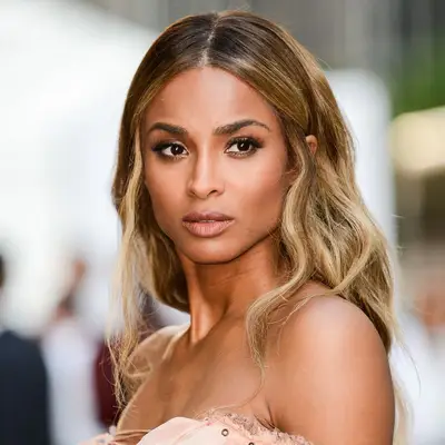Ciara with ashy caramel ombre hair 