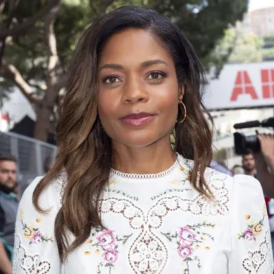 Naomie Harris with rich caramel brunette hair color 