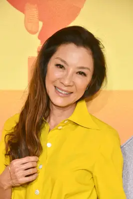 Michelle Yeoh grown-out caramel hair
