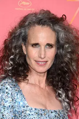 Close up of Andie MacDowell with curly grey hair