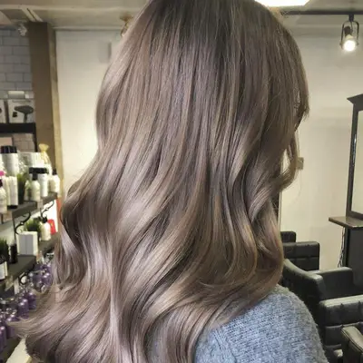 Back view of silky, ash-toned mushroom blonde hair