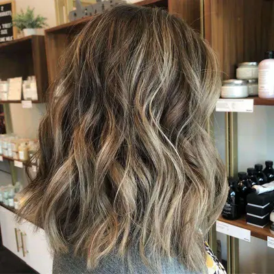 Back view of curled mushroom blonde and brown hair