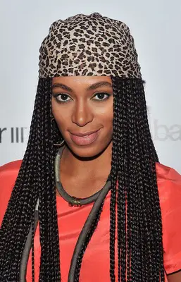Solange wearing a leopard-printed scarf with her braids at the 2011 Macy
