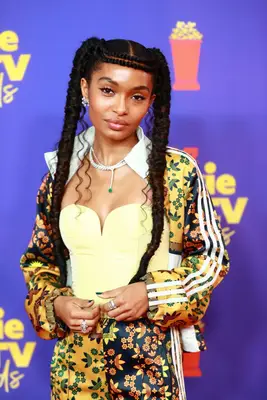 Yara Shahidi with a dramatic braided pigtail hairstyle at the 2021 MTV Movie & TV Awards in Los Angeles