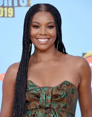 Gabrielle Union with long braids and a center part at the 2019 Nickelodeon Kids