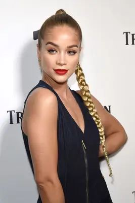 Jasmine Sanders with a long blonde braided high ponytail at the 2018 Bella Hadid x True Religion Event Campaign Party in Los Angeles