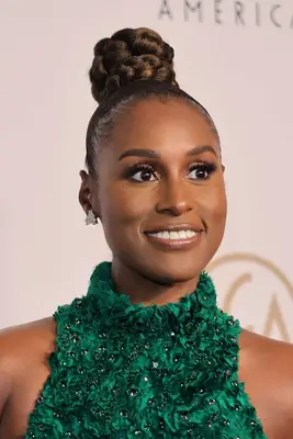 Issa Rae with a braided bun hairstyle at the 2022 Producers Guild Awards in Los Angeles