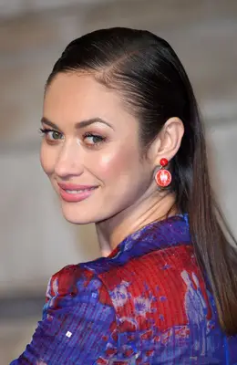 Olga Kurylenko in a slicked-back wet hair look