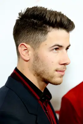 nick jonas subtle fade hair style