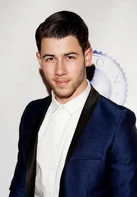 nick jonas gel pompadour hair style