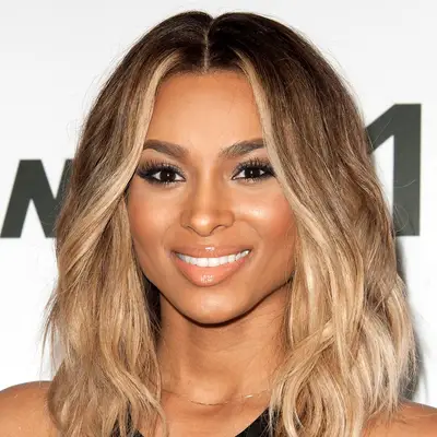 Ciara smiling at a media event