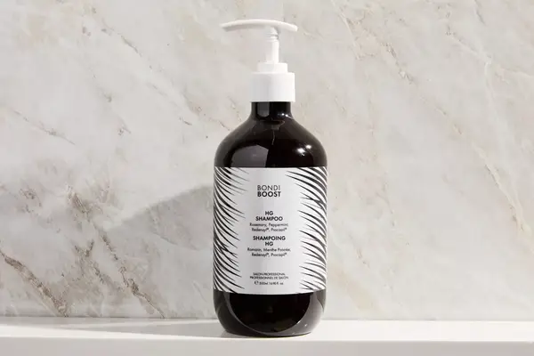 A bottle of the BondiBoost HG Shampoo for Thinning Hair
