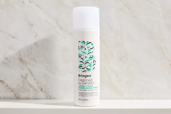a bottle of the Briogeo Destined For Density Caffeine + Biotin Density Shampoo