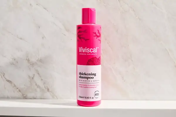 A bottle of the Viviscal Thickening Shampoo