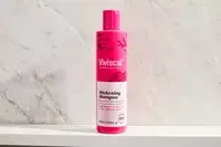 A bottle of the Viviscal Thickening Shampoo