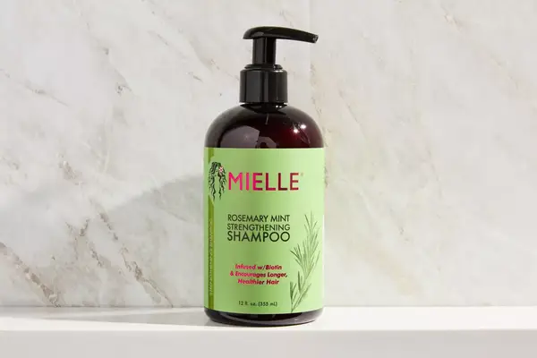 A bottle of the Mielle Rosemary Mint Strengthening Shampoo