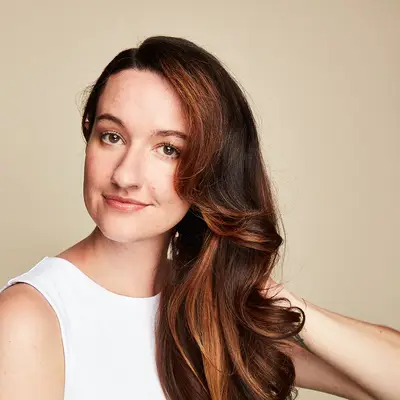 Woman with hair that has been hot rolled