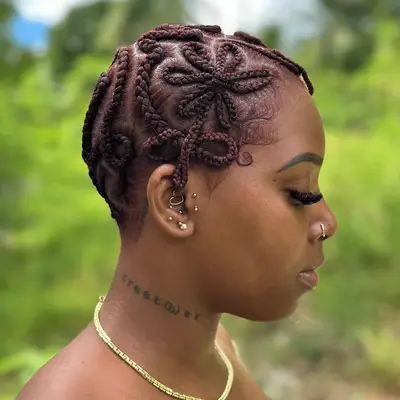 woman with braided baldie hairstyle