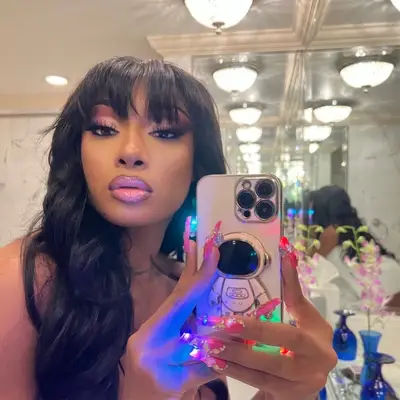 Megan Thee Stallion wearing mall bangs