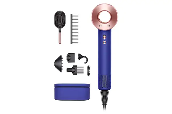 Blue and gold Dyson Supersonic Hair Dryer with attachments shown