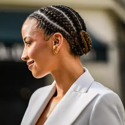 Flora Coquerel showcasing a braided hairstyle