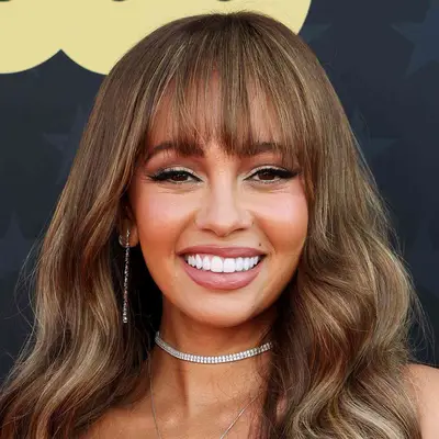 Vanessa Morgan wears a long highlighted fringe while on the red carpet at Critics Choice Awards