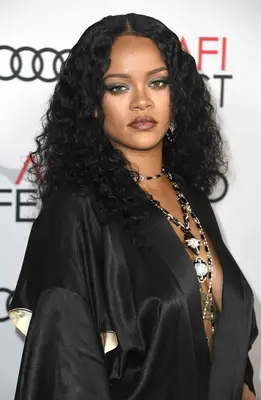 Rihanna with mid-length curls