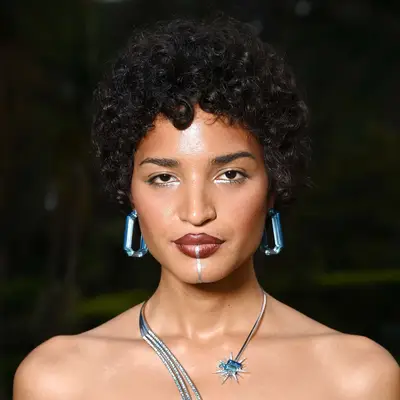 Indya Moore with cropped curls at amfAR Cannes Gala 2022