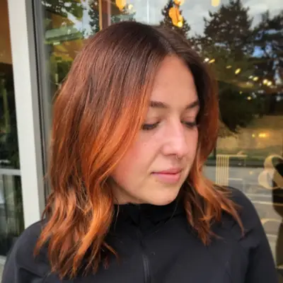 Firecracker red balayage on brown hair