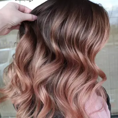 Brown balayage with a rose colored overlay