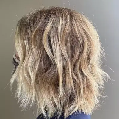Dirty blonde balayage on short hair