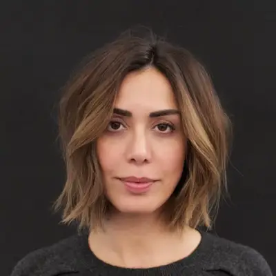 Face-framing butterscotch balayage on a bob haircut