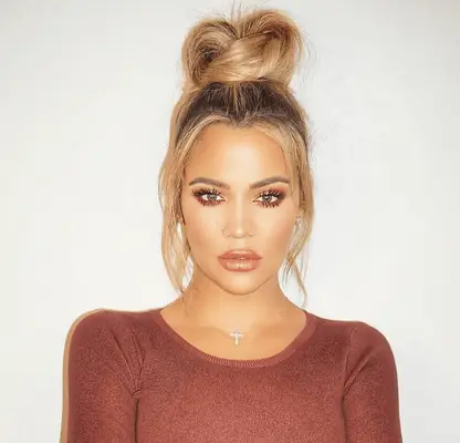 Khloe Kardashian in a perfectly knotted high bun