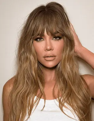 Kardashian with wavy hair