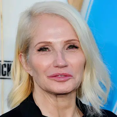 Ellen Barkin wears a side-swept long bob hairstyle