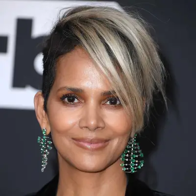 Halle Berry wears a textured pixie cut with blonde bangs