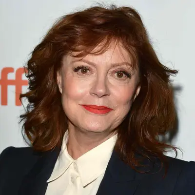 Susan Sarandon wears a wavy, tousled hairstyle with layers