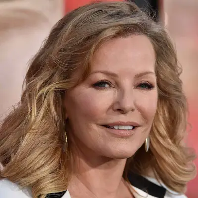 Cheryl Ladd wears a shoulder-length, voluminous wavy hairstyle